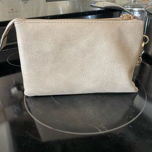 Greyish taupe wristlets. Barley used. In great condition